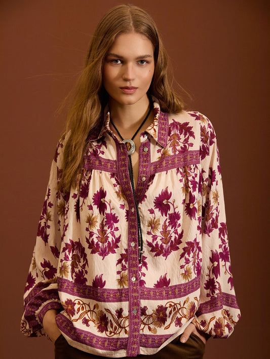 BLUSA ESTAMPADA CON MANGA ABULLONADA