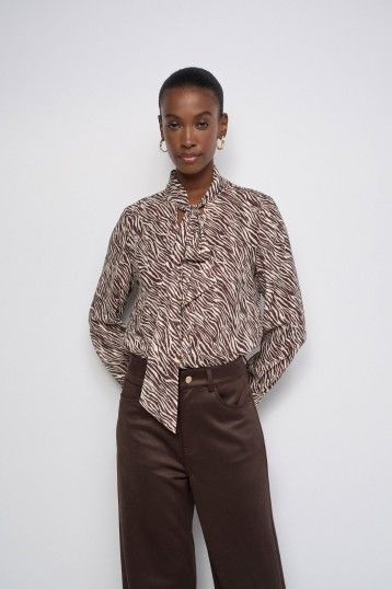BLUSA CON LAZADA ANIMAL PRINT