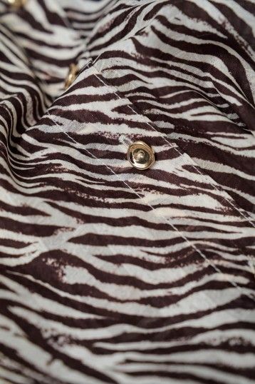 BLUSA CON LAZADA ANIMAL PRINT