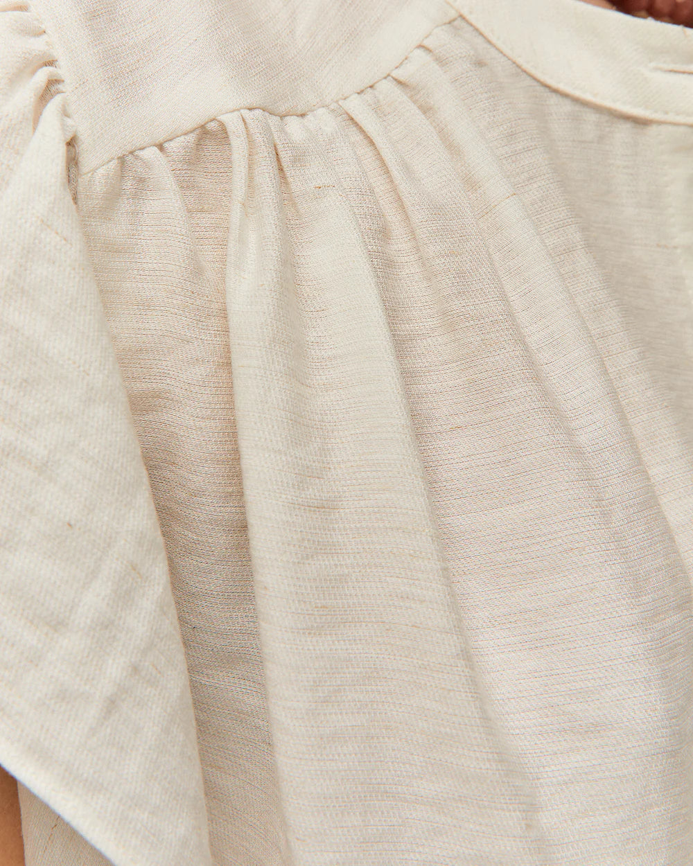 BLUSA DE LINO CON VOLANTES