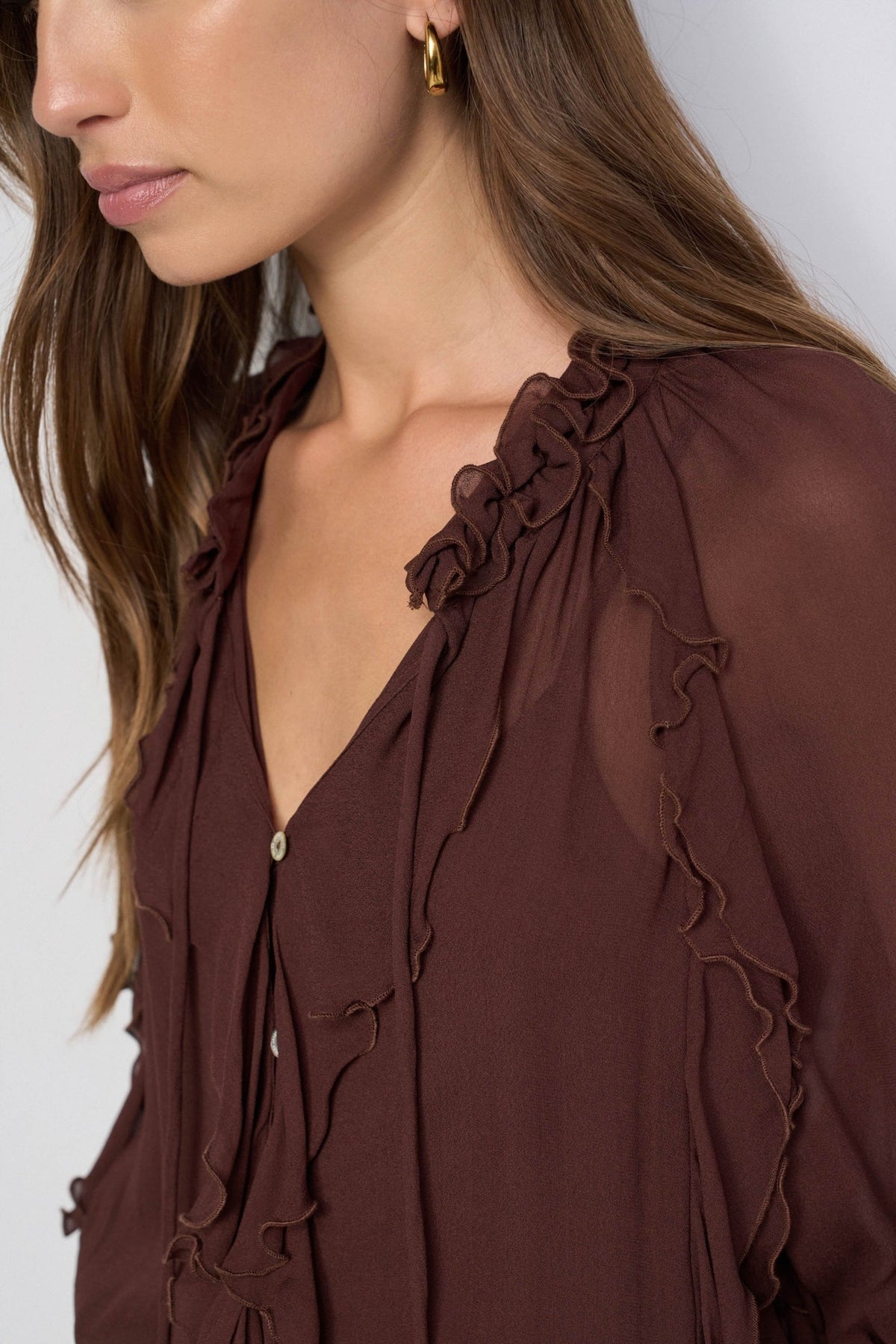 BLUSA CON VOLANTES
