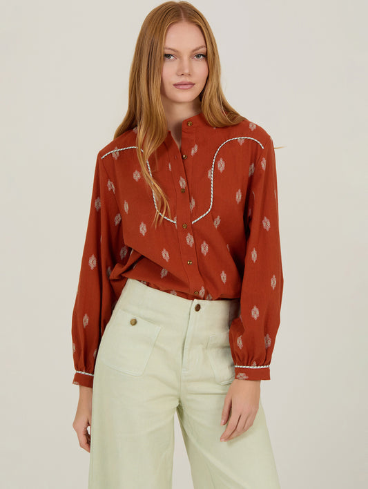 BLUSA ESTAMPADA CON VIVO