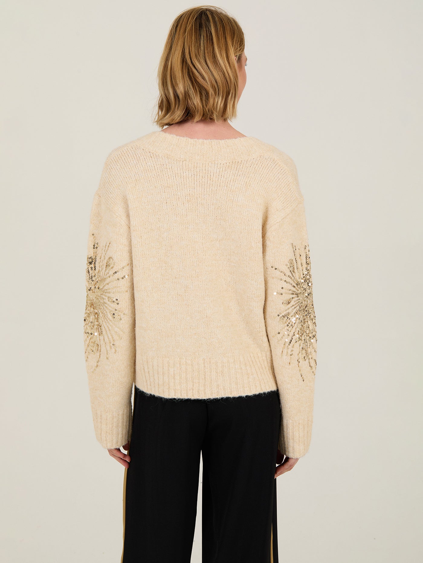 JERSEY CON LENTEJUELAS