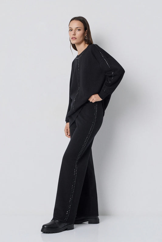 PANTALONES DE PUNTO CON TACHAS