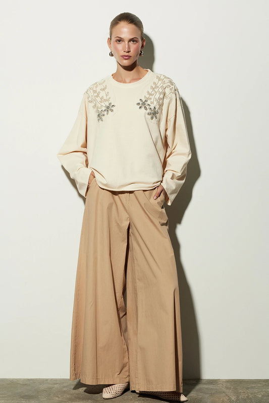 SUDADERA CON APLICACIONES