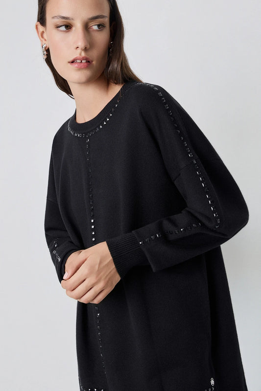 SUDADERA DE PUNTO CON TACHAAS